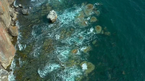 Coastal cliffs on which a sea  wave. Stock Footage 129701233