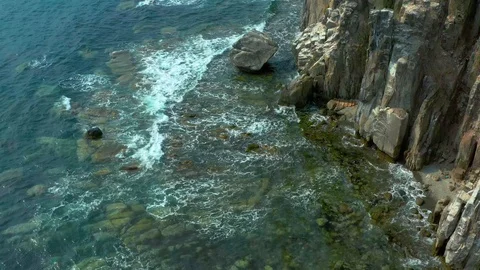 Coastal cliffs on which a sea  wave. Stock Footage 129701393