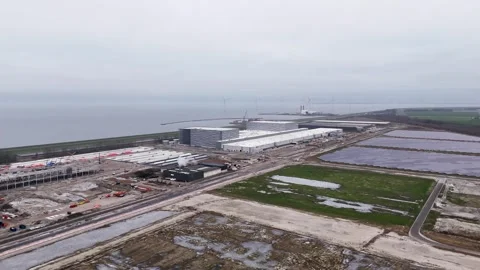 Coastal Distribution Site Featuring Solar Power Installations And Ongoing Stock Footage 325452820
