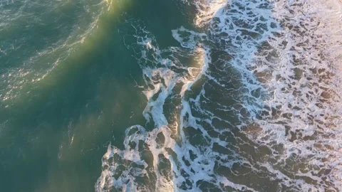 Coastal Drone Shot Of Rolling Waves Meeting Sand Beach Stock Footage 328142685