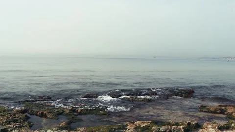 Coastal Elegance- Soft Waves Embracing Seashore Stock Footage 270713139