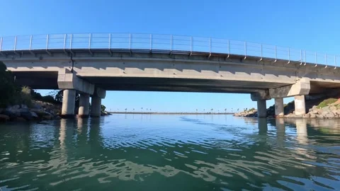 Coastal Lagoon Rail Bridge Underpass and Highway Architecture Stock Footage 331765936