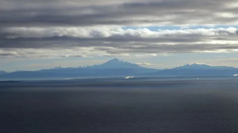 Coastal Landscape From the Sea with Distant Mount Baker Aerial View Video stock 345628299