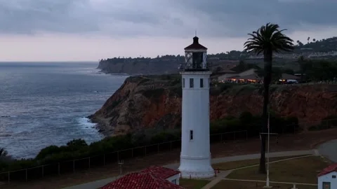Coastal Lighthouse at Sunset (Close &amp; Far) Stock Footage 340578868