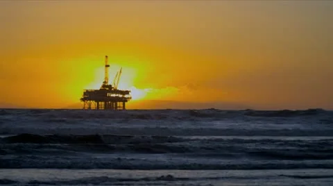 Coastal Oil Production Platform Sunset Stock Footage