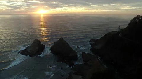 Coastal Oregon lighthouse at sunset Stock Footage 55808890