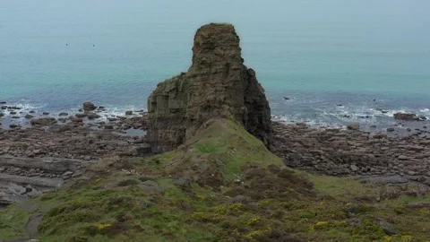 Coastal pathway to rock Stock Footage 228633687