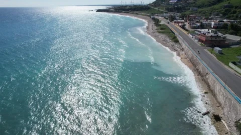 Coastal road along a sandy beach, aerial view Stock Footage 278370273