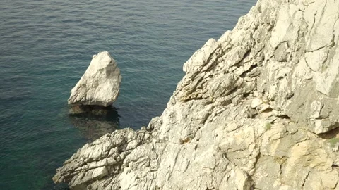 Coastal rock formations off small Mediterranean island Video stock 160981825