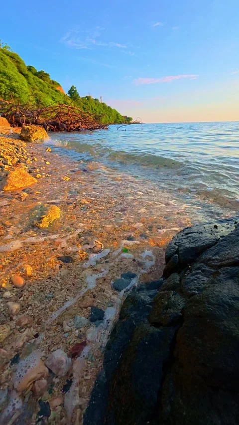 Coastal Scene at Sunset with Waves. Stock Footage 305981293