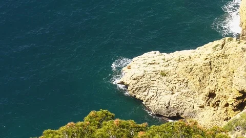 Coastal Sea Cliffs With Breaking Waves Slow Motion Calming Nature Background HD Stock Footage 108421092