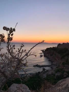 Coastal sunset in Greece Stock Photos
