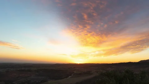 Coastal sunset over mountains time lapse 4k 24fps Stock Footage 132851300