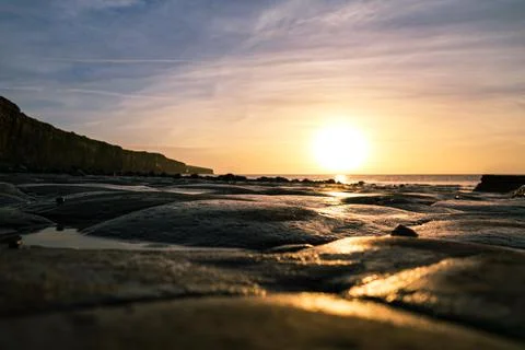 Coastal sunset Stock Photos