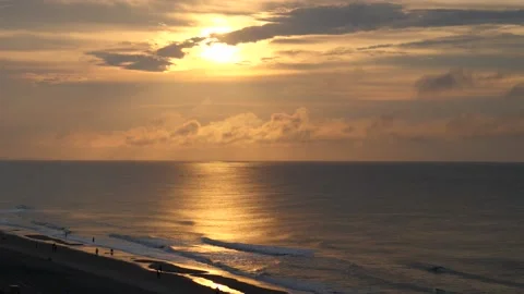Coastal sunset with reflection on the water and tropical beach Video stock 157306014