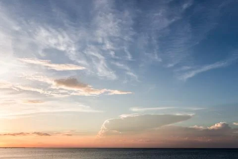 Coastal sunset sky Stock Photos
