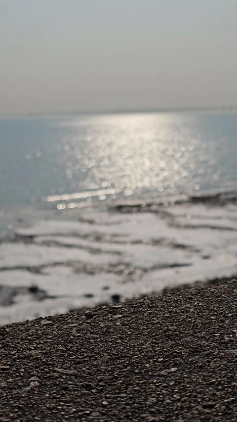 Coastal Texture Foreground with Shimmering Ocean Bokeh Background, 4K Vídeos de archivo 330165338