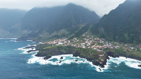 Coastal tiny Seixal town on volcanic rock on Madeira Island in Atlantic ocean Video stock 279568718