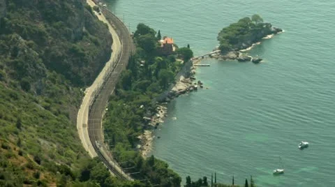Coastal train and road.Cote D'Azur. Stock Footage