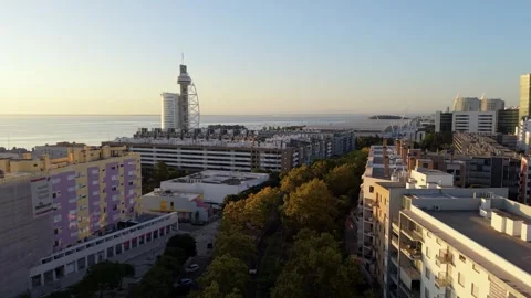 Coastal urban view at dawn; Parque das Nacoes Video stock 346072077