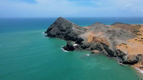 Coastal View of Cabo de la Vela with Rocky Terrain Stock Footage 330380444