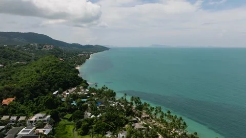 Coastal view with lush greenery and turquoise sea. Ko Samui, Thailand. Stock Footage 311033811