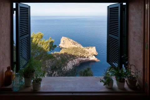 Coastal View Through Window in Majorca Stock Photos