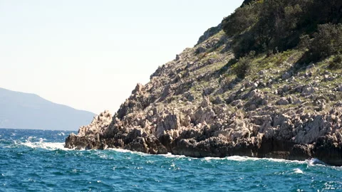 Coastal Waves on a Bright Summer Day Stock Footage 338258913