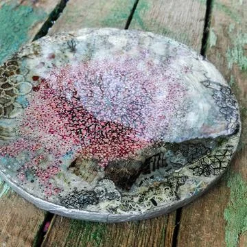 Coaster handmade with a flowering tree Stock Photos