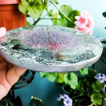 Coaster handmade with a flowering tree Stock Photos