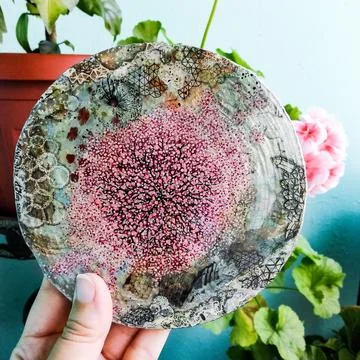 Coaster handmade with a flowering tree Stock Photos