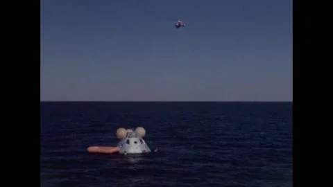 Coastguard flying over Apollo 8 backup crew command module water egress training Stock Footage 271518060