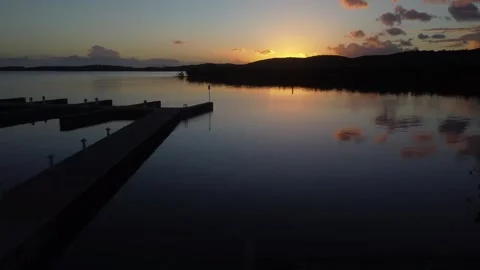 Coastline and Mountainous Background With The Sunset Stock Footage 273836148