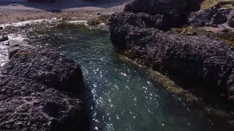 Coastline, between rocks and ocean waves cinematic drone footage 2.7k Stock Footage 209186853
