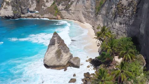 Coastline, cliffs with beach and blue ocean on Nusa Penida island. Aerial v.. Stock Footage 255832748