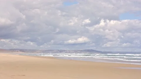 Coastline with clouds on the beach, steady shot Stock Footage 212460714