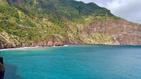 The coastline of Madeira Island. There are high cliffs all around. Video stock 304315341