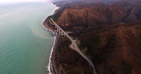 Coastline with mountainous terrain Stock Footage 83219272
