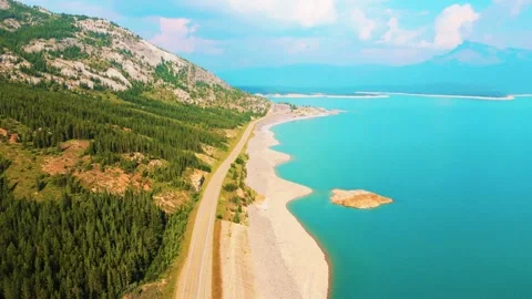 The coastline is right next to the road Stock Footage 305272991