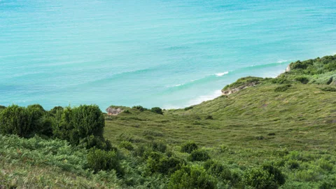 Coastline Scenery Timelapse over a Hill and the Ocean. Stock Footage 340828094