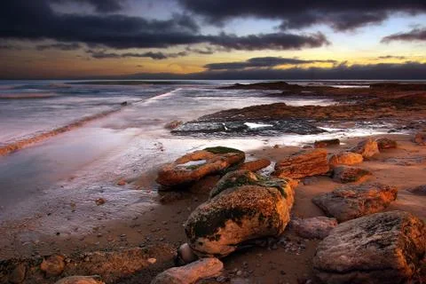 Coastline at twilight Stock Photos