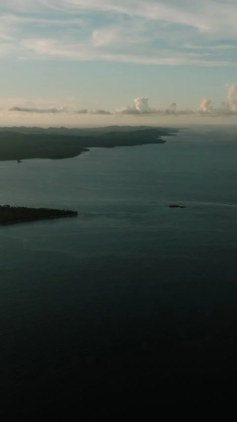 Coastline view with clouds over calm sea. Siargao, Philippines. Stock Footage 321104365