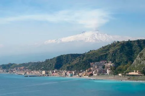 Coastline view of Etna Volcano from Taormina, Sicily, Italy. Stock Photos