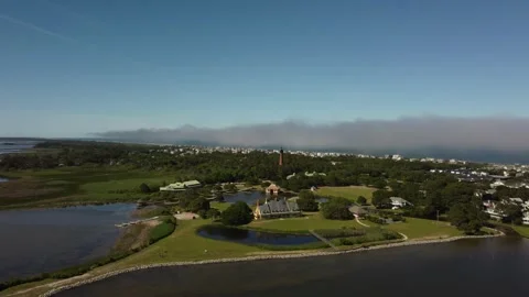 Coastline View of Lighthouse Stock Footage 277016663