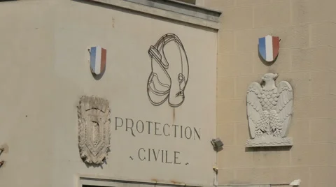 Coat of arms and two flags of France on Protection Civile building, Nice Stock Footage 61066994