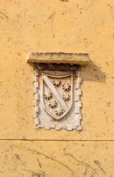 Coat of arms on the wall Stock Photos