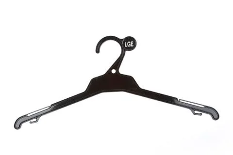 Coat hanger isolated on plain background Stock Photos