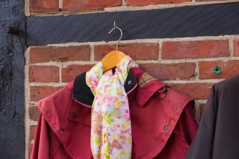 Coat with scarf Stock Photos