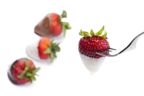 Coated strawberries Stock Photos