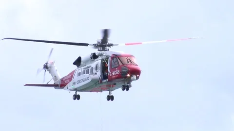 Coatguard Helicopter on exercise in Shetland Stock Footage 77646139